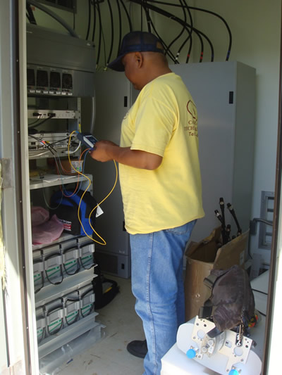 Tech conducting testing at the Yona site